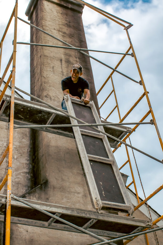 Lead certified technician from BB Dryer Vents and Brass & Burn performing professional chimney repair in Chester County, PA